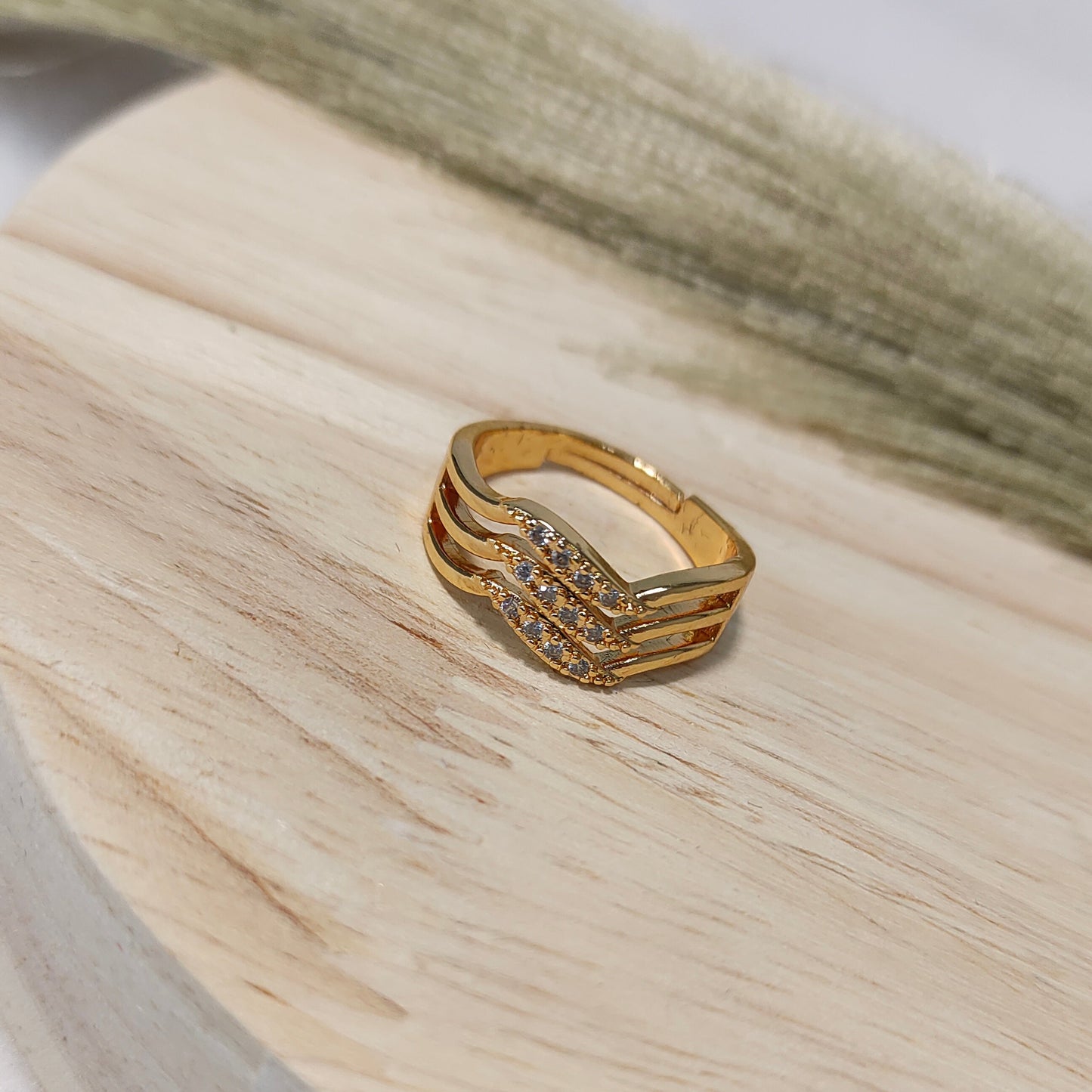 Gold toned wavy band