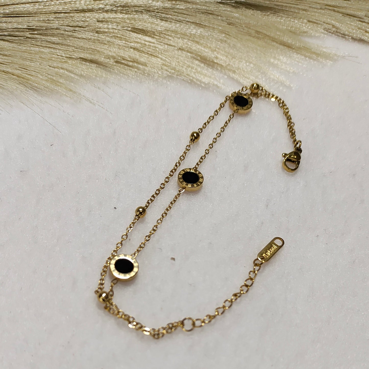 Layered charm bracelet