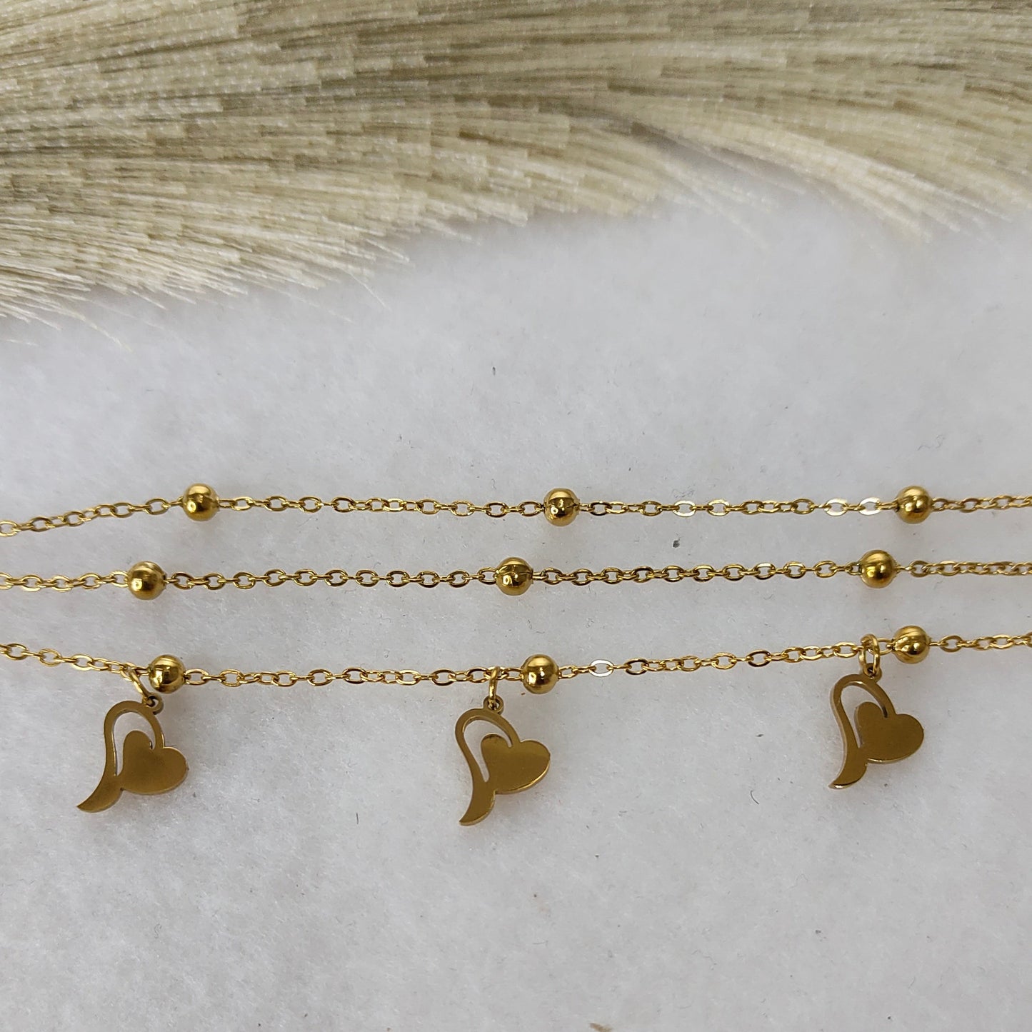 Layered heart charm bracelet