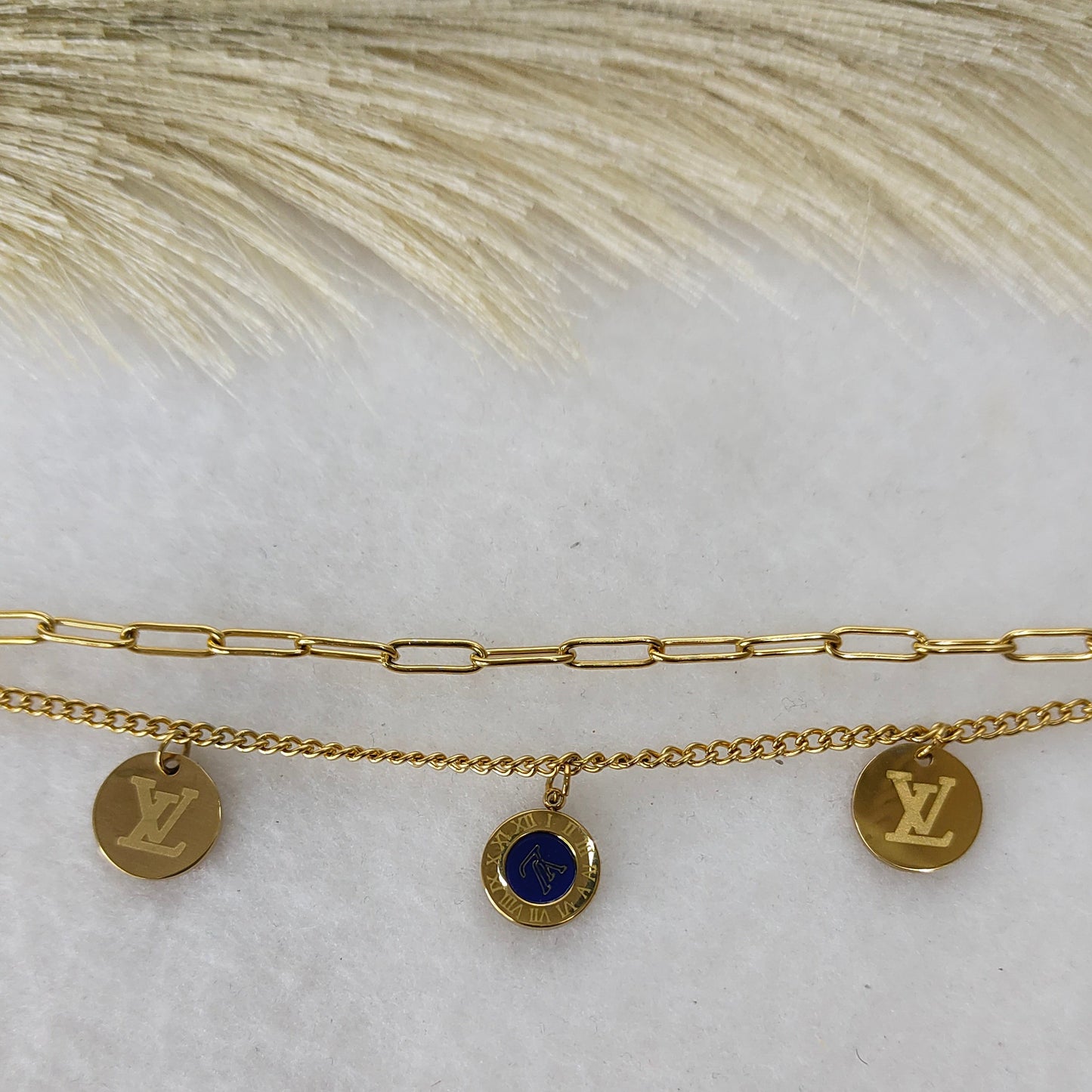 Layered round charm bracelet