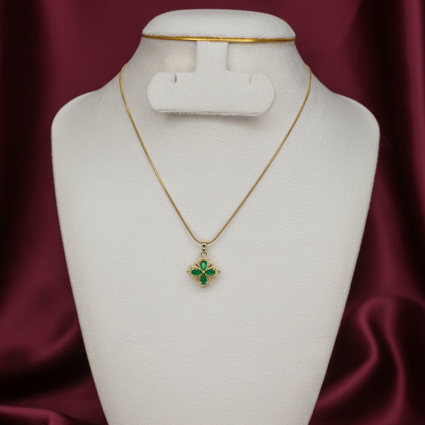 Gold framed emarald pendant necklace