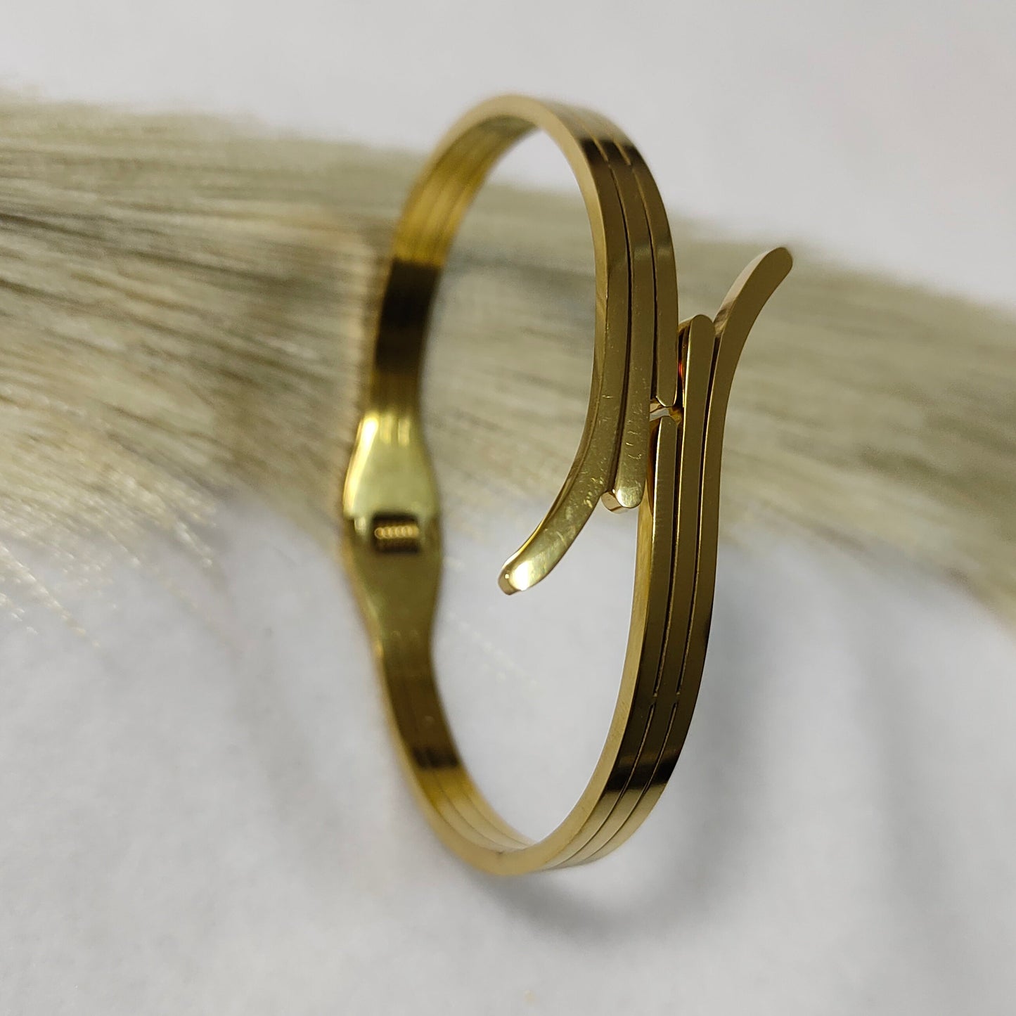 Gold plated plane kada bracelet