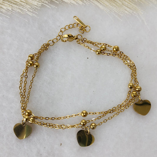Layered heart charm bracelet