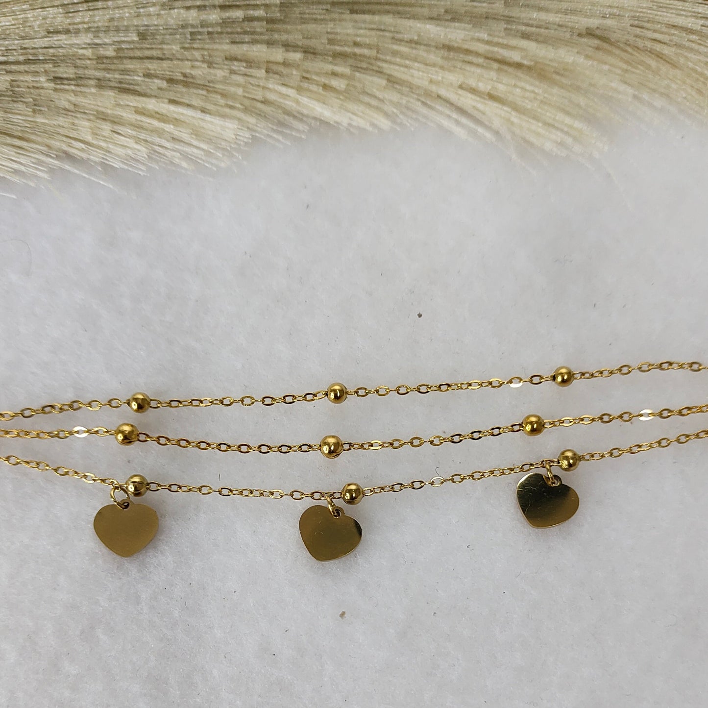 Layered heart charm bracelet