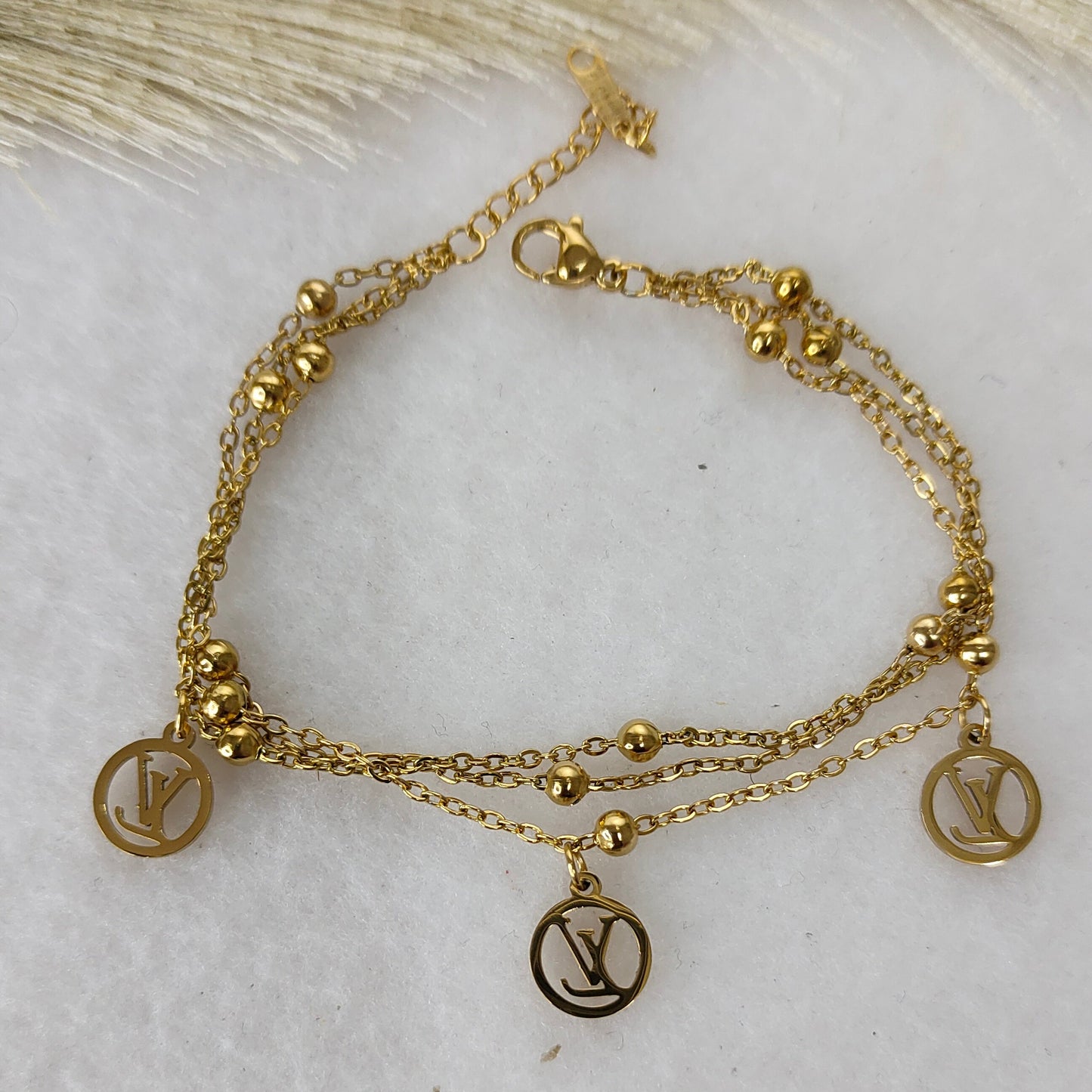 Layered VL charm bracelet