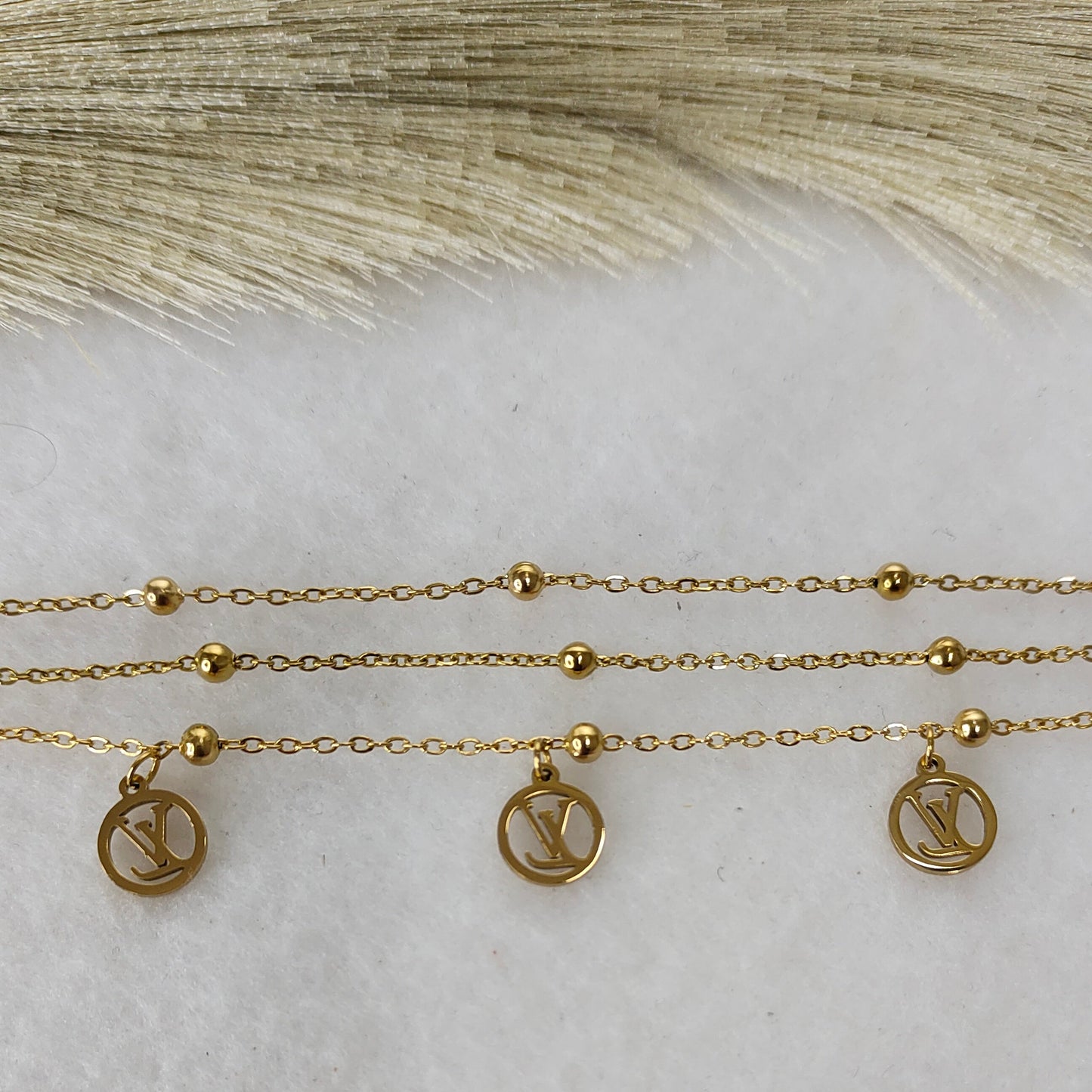 Layered VL charm bracelet