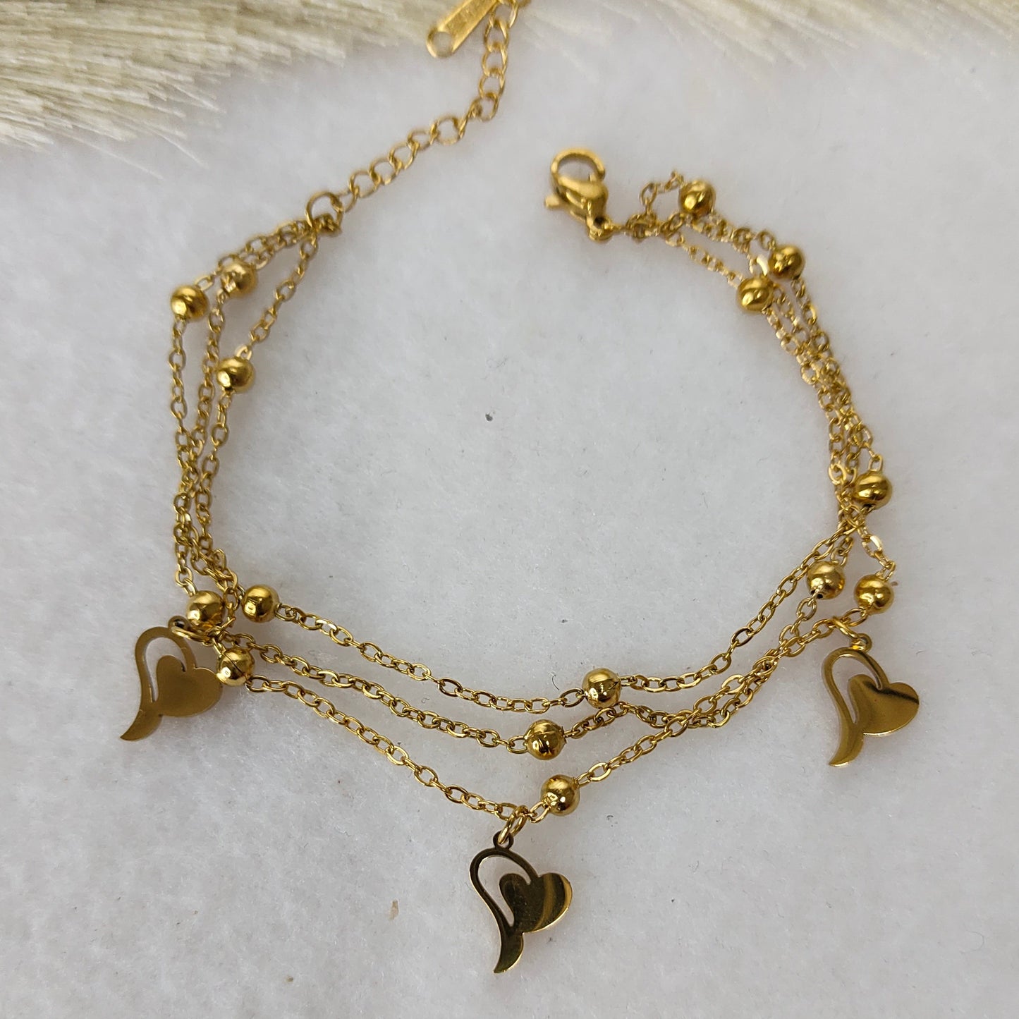 Layered heart charm bracelet