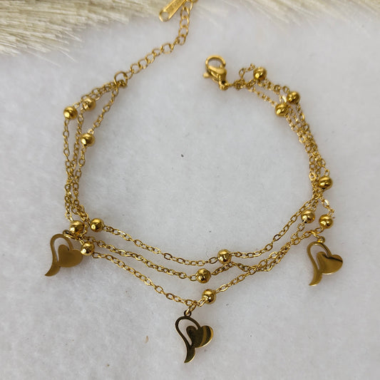 Layered heart charm bracelet