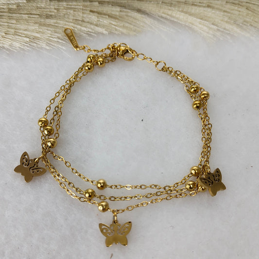 Layered butterfly charm bracelet