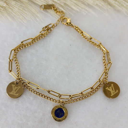 Layered round charm bracelet